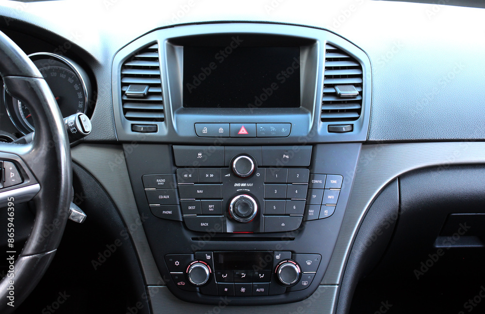 Car Touch screen multimedia with black screen. Screen multimedia system in a modern car. Car dashboard with multimedia touch screen. Modern car interior. Car Touch screen multimedia with black screen. Screen multimedia system in a modern car. Car dashboard with multimedia touch screen. Modern car interior.