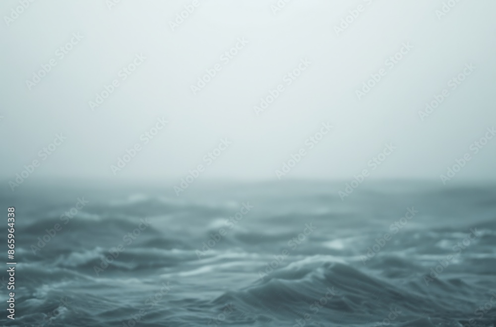 Moody ocean scene with misty horizon and turbulent waves, capturing the raw power and beauty of nature on a foggy day. Moody ocean scene with misty horizon and turbulent waves, capturing the raw power and beauty of nature on a foggy day.