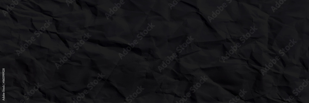 Recycled crumpled black paper texture or paper background for design with copy space for text or image Recycled crumpled black paper texture or paper background for design with copy space for text or image