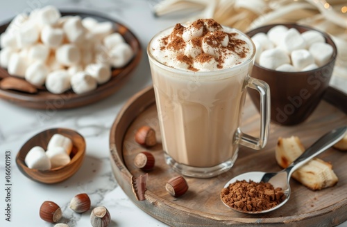 Close Up of a Creamy Coffee Drink With Marshmallows, Cocoa Powder, and Hazelnuts