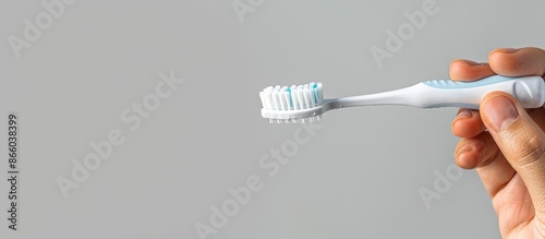 Close-up image of a hand ho...