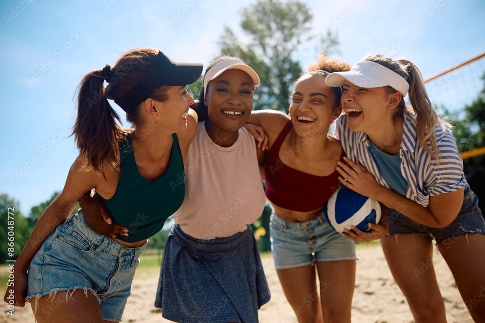 Group of happy women having fun while playing volleyball on the beach. Group of happy women having fun while playing volleyball on the beach.