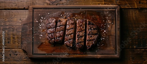 Grilled steak displayed on ...