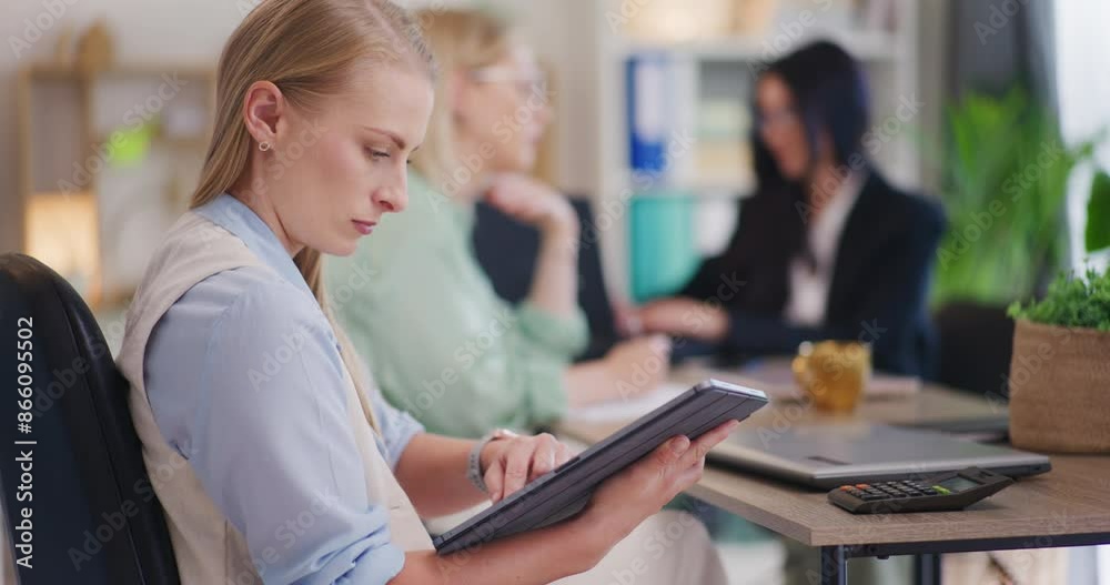 Businesswoman Using Tablet in Corporate Office Businesswoman Using Tablet in Corporate Office