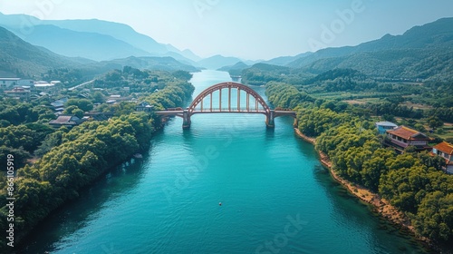 Drone perspective of the Kintai Bridge arching over the Nishiki River in Iwakuni photo
