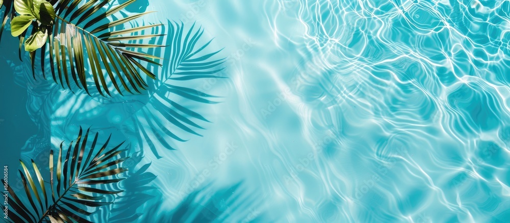 Pool edge and water with exotic summer vibes. Minimal vacation idea captured in a flat lay, top view composition with space for text. Pool edge and water with exotic summer vibes. Minimal vacation idea captured in a flat lay, top view composition with space for text.