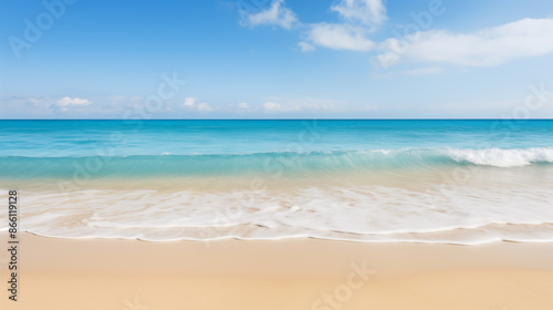 Serene Sandy Beach with Blue Ocean, Tranquil Seaside, Summer Vacation Scene with Copy Space