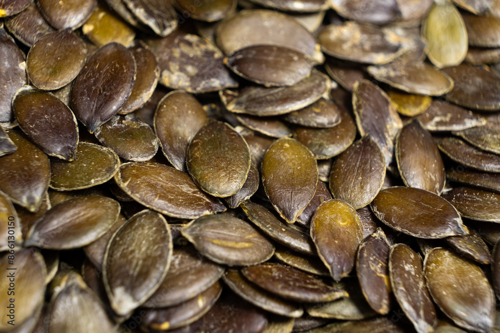 Peeled pumpkin seeds, kernels close-up Peeled pumpkin seeds, kernels close-up
