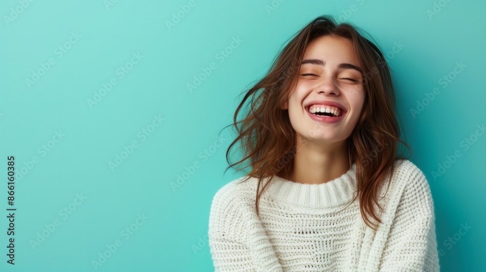 A portrait of a beautiful laughing girl in a white sweater on a turquoise background, radiating joy and happiness. AI generative A portrait of a beautiful laughing girl in a white sweater on a turquoise background, radiating joy and happiness. AI generative