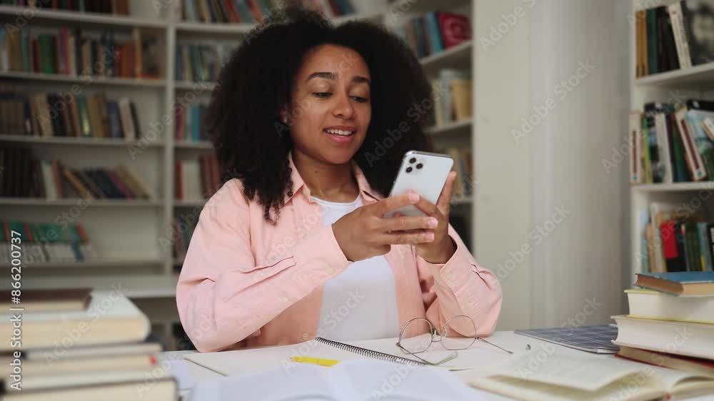 Tired exhausted boring young woman freelancer student with smartphone dozing while remembered about interesting education app or website and looking at camera showing thumbs up at university class Tired exhausted boring young woman freelancer student with smartphone dozing while remembered about interesting education app or website and looking at camera showing thumbs up at university class