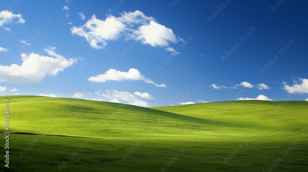 Idyllic Green Hills under Blue Sky with Fluffy White Clouds. Concept of nature, peace, serenity, and tranquility Idyllic Green Hills under Blue Sky with Fluffy White Clouds. Concept of nature, peace, serenity, and tranquility