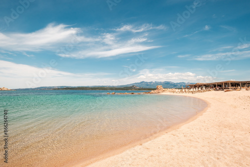 Turquoise Mediterranean sea and beach bar at the Plage de Tonnara on the south west coast of the island of Corsica