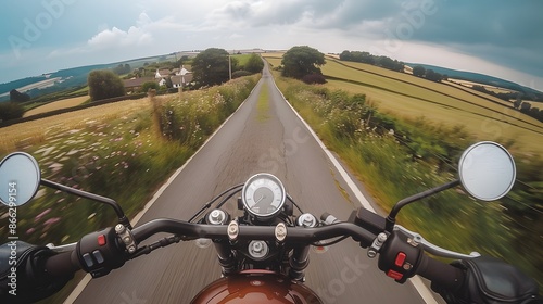 Mountain Adventure: Biker's POV Through Scenic Landscapes photo