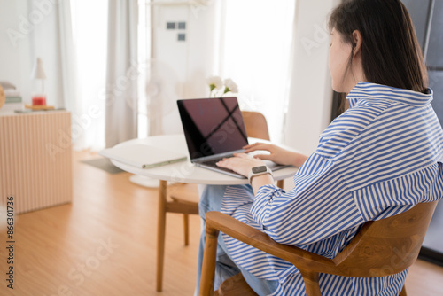 asian woman freelancer relax and happy during working from home