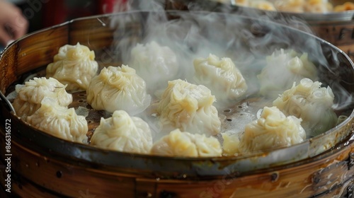 Dimsum or dumplings are being made or steamed