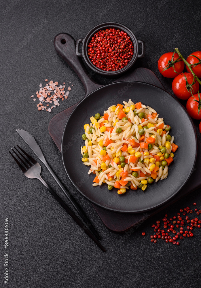 Delicious boiled rice with vegetables corn, carrots, peas with salt Delicious boiled rice with vegetables corn, carrots, peas with salt
