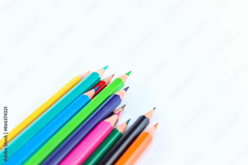 a bunch of colored pencils isolated on white background close up a bunch of colored pencils isolated on white background close up