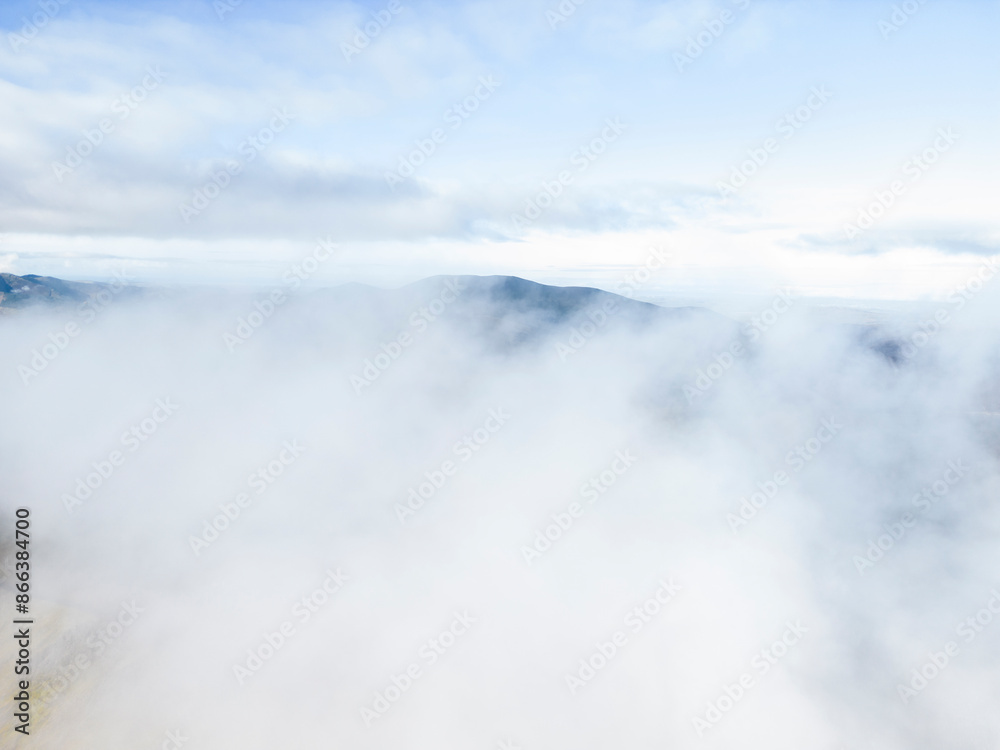 Obraz premium Amazing Cloud Inversion Over Mountain In The Lake Distract From Above