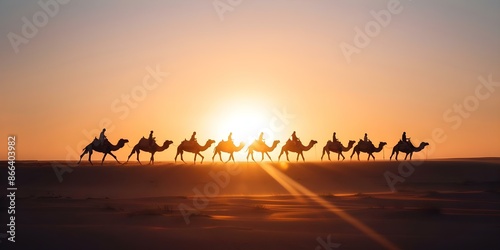 Silhouette of people riding camels in the desert at sunset. Concept Desert Sunset, Camel Silhouettes, Travel Photography, Adventure, Landscape Portrait