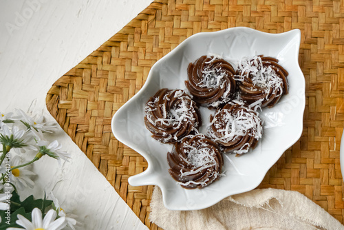 Kuih Kasui, Malaysia traditional cake, made from tapioca flour and wheat flour, served with shredded coconut.