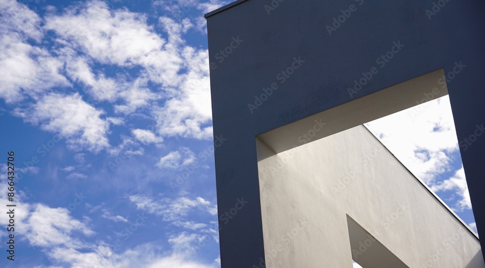 detail of modern facade of white house against sky detail of modern facade of white house against sky