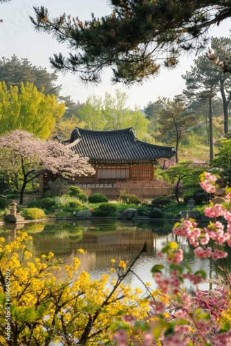 A hanok by a pond, framed by blossoming flowers and verdant trees, bathed in the gentle light of a spring afternoon.