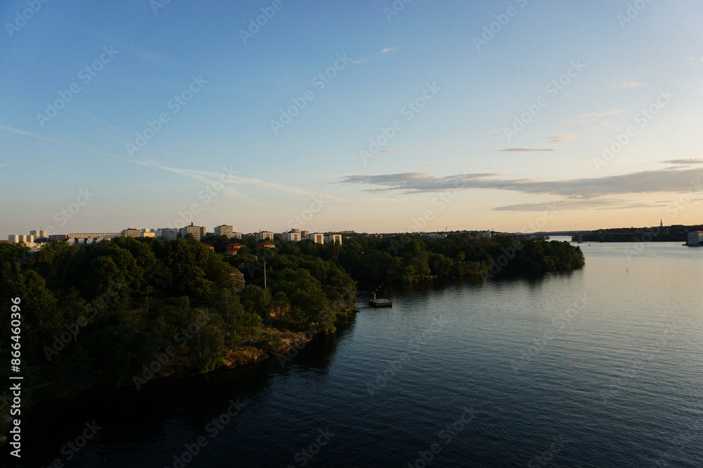 Scenic view of river against sky at sunset Scenic view of river against sky at sunset