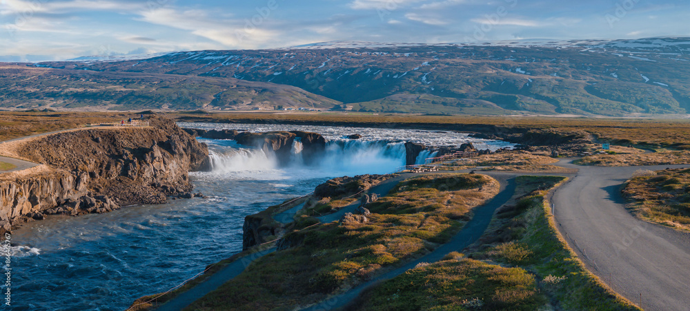 Obraz premium Aerial view of the powerful Godafoss waterfall on a sunny day in Northern Iceland. Beautiful Godafoss Waterfall in Northern Iceland.