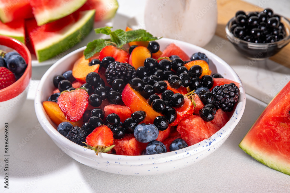 Summer fruit berry salad with tapioca pearls. Healthy diet refreshment salad with watermelon, strawberry, blueberry and bubble tea balls, on white table background copy space Summer fruit berry salad with tapioca pearls. Healthy diet refreshment salad with watermelon, strawberry, blueberry and bubble tea balls, on white table background copy space