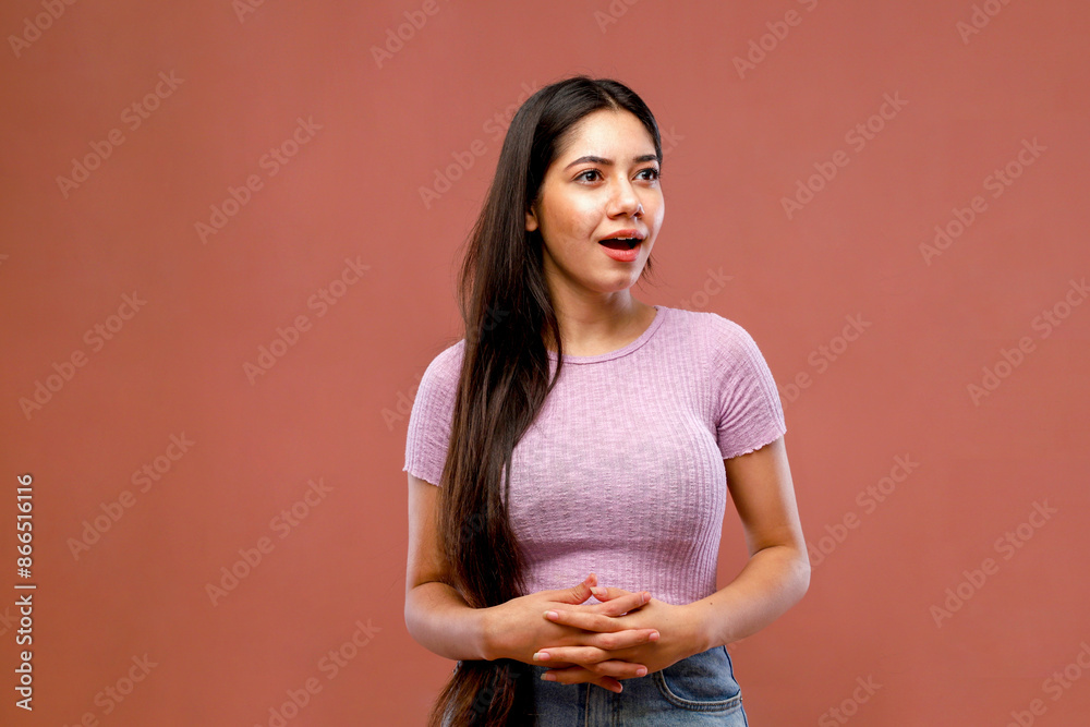 Obraz premium A Joyful Woman Is Giving Joyful Facial Expressions While Posing