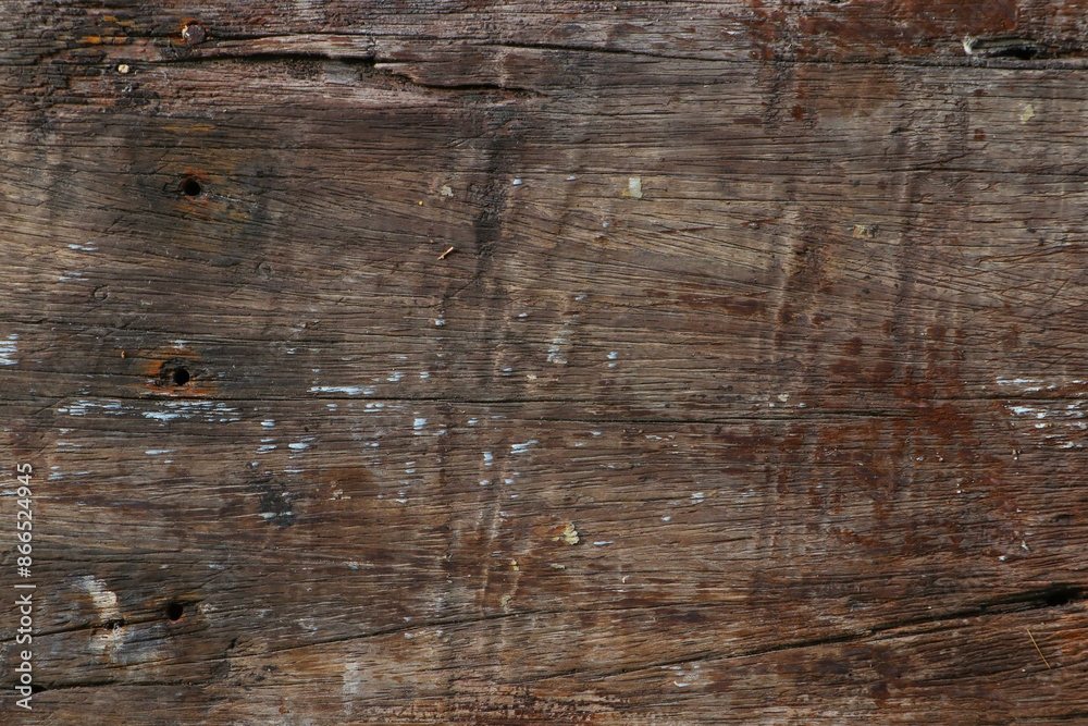 Old wooden texture for background that has natural cracks.