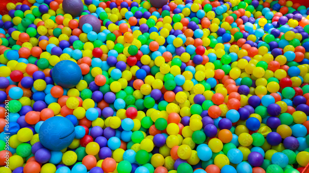 A vibrant and cheerful ball pit filled with an abundance of colorful plastic balls. A Colorful Sea of Plastic Balls in a Ball Pit A vibrant and cheerful ball pit filled with an abundance of colorful plastic balls. A Colorful Sea of Plastic Balls in a Ball Pit