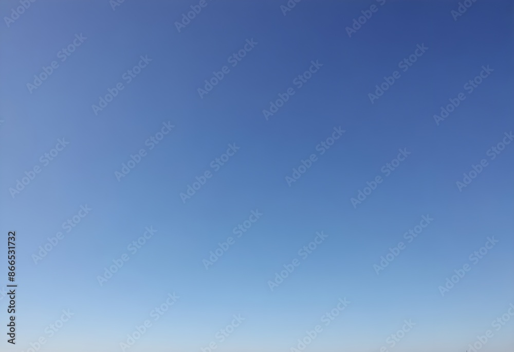Clear blue sky, no clouds, among spoiled tree branches in winter time, cold, deep light blue, no people Clear blue sky, no clouds, among spoiled tree branches in winter time, cold, deep light blue, no people