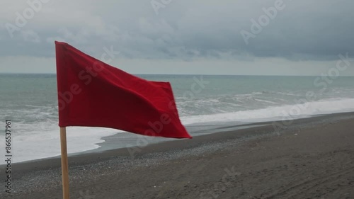 A red flag. The ban on bathing. Big waves. The danger of swimming