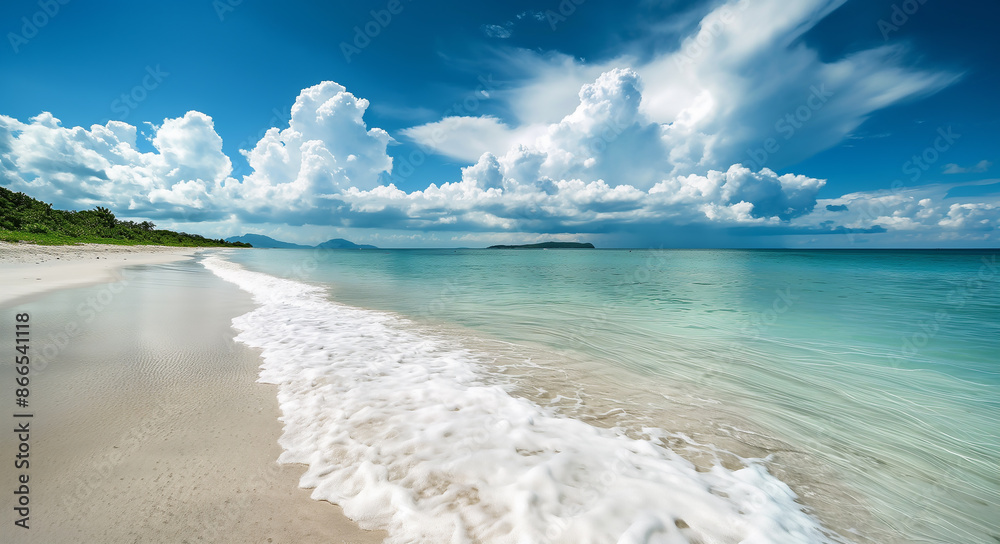 Tropical Beach with Turquoise Waters and Clouds
Tropical Beach with Turquoise Waters and Clouds