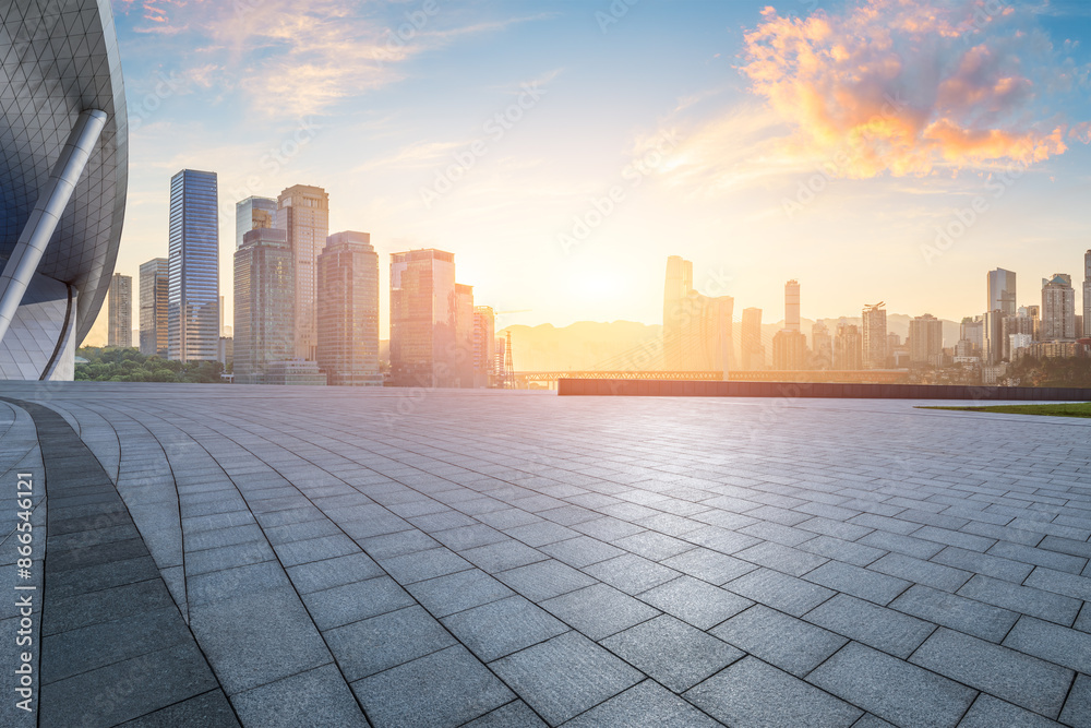Empty square floors with modern city buildings scenery at sunrise in Chongqing. car advertising background. Empty square floors with modern city buildings scenery at sunrise in Chongqing. car advertising background.
