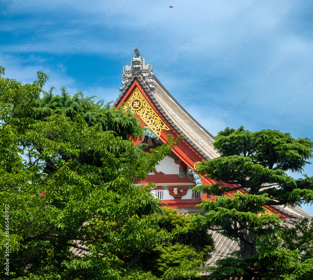 The fascinating and intricate wooden architecture of the historical Senso-Ji Temple in the central Tokyo district of Asakusa, Japan The fascinating and intricate wooden architecture of the historical Senso-Ji Temple in the central Tokyo district of Asakusa, Japan