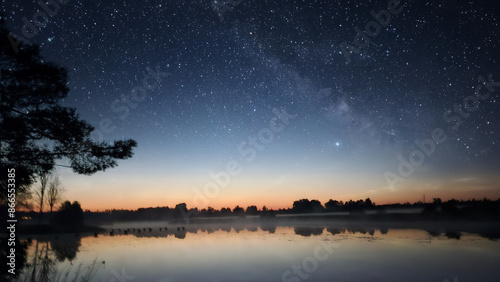  northern lights on the shore of the lake where the end of the footbridge is illuminated in the water