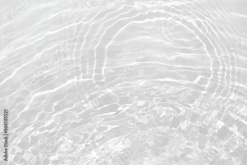 White water with ripples on the surface. Defocus blurred transparent white colored clear calm water surface texture with splashes and bubbles. Water waves with shining pattern texture background.