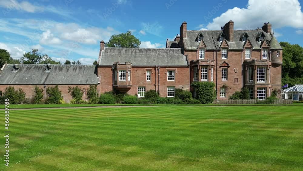 castle high end mansion real estate luxury property low altitude low level drone aerial sunshine panning green grass gardens castle high end mansion real estate luxury property low altitude low level drone aerial sunshine panning green grass gardens