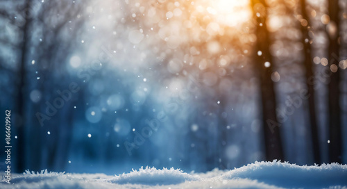 Winter snow background texture with bokeh lighting