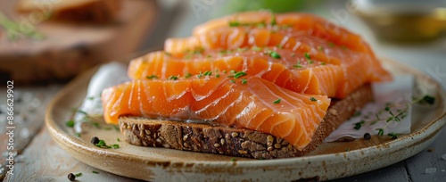Sliced Smoked Salmon With Parsley on Toasted Bread
