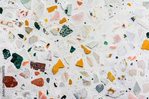 An abstract background shown from the top of a terrazzo floor surface