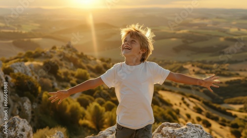 A boy enjoying sunset photo