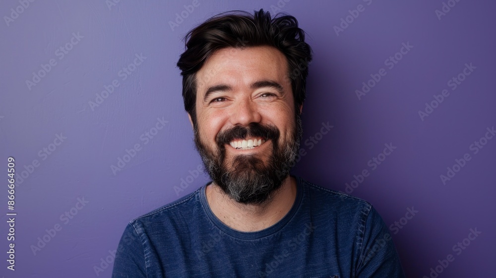 middle aged man with beard smiling at the camera on purple background in high resolution and quality middle aged man with beard smiling at the camera on purple background in high resolution and quality