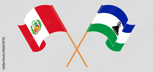 Crossed and waving flags of Peru and Lesotho