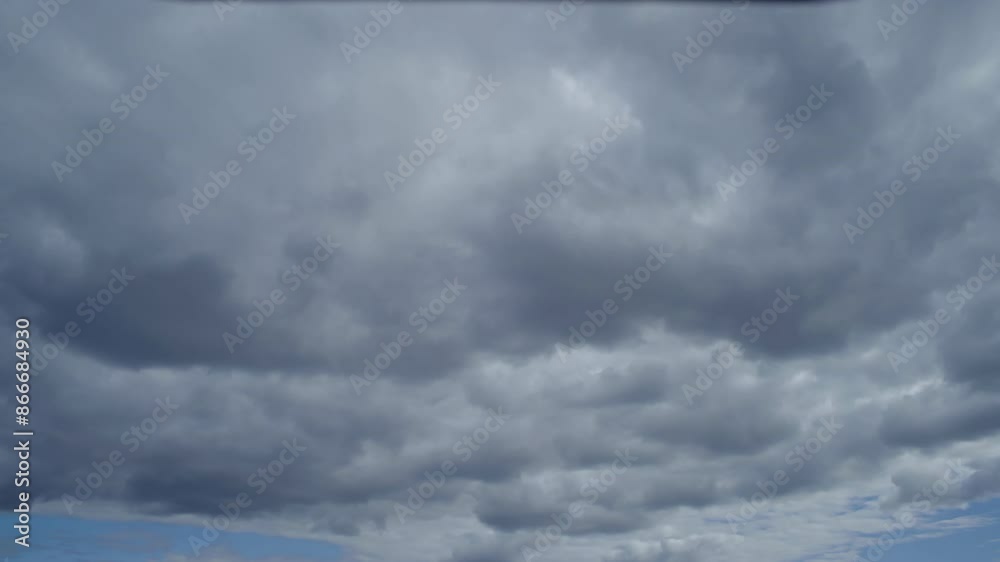 Time lapse, Stratus Cumulus flying into the distance across blue sky Time lapse, Stratus Cumulus flying into the distance across blue sky