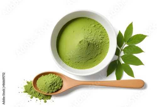 A White Bowl Filled with Green Powdered Matcha Tea, Accompanied by a Wooden Spoon and Fresh Green Leaves - Authentic and Antioxidant-Rich Japanese Beverage