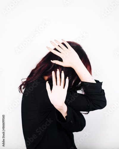Female portrait. Curly hair. White background. Emotions