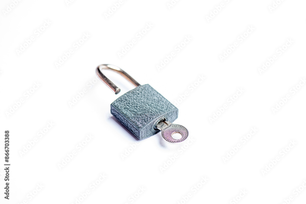 Open lock and key isolated on white background Open lock and key isolated on white background